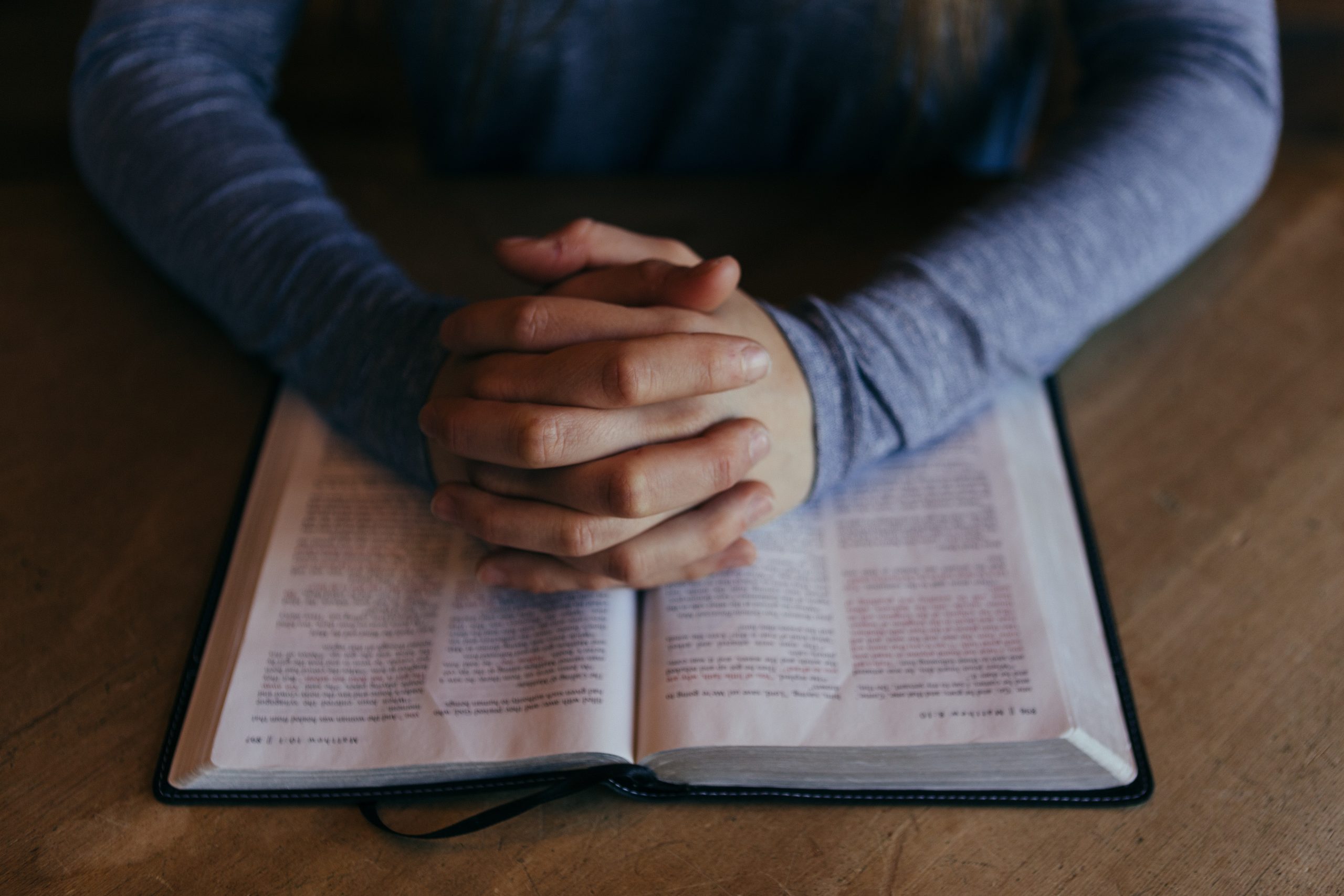patrick-fore-b_SHPU5M3nk-unsplash hands on bible